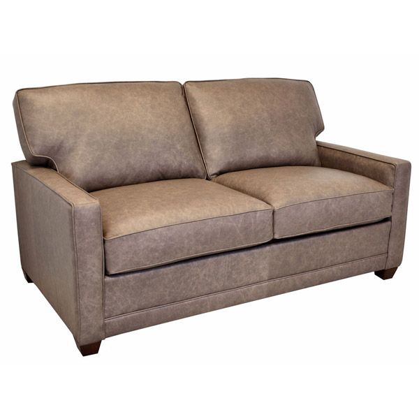 Brown upholstered loveseat with two seat cushions and angled armrests on a white background