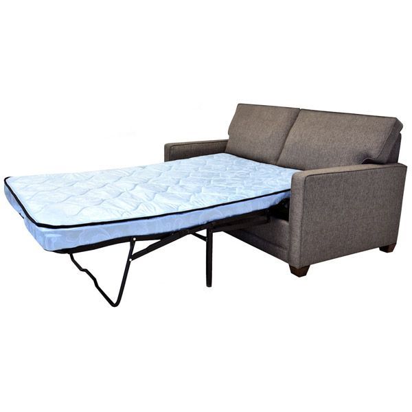 Gray sofa converted into a bed with a light blue mattress extending from the seat