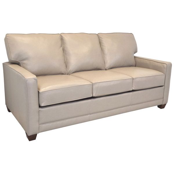 Beige three-cushion sofa with low wooden legs on a white background