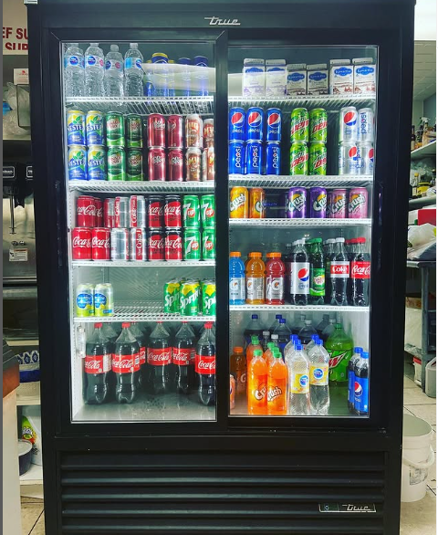 A bunch of mini pies are sitting on a table.