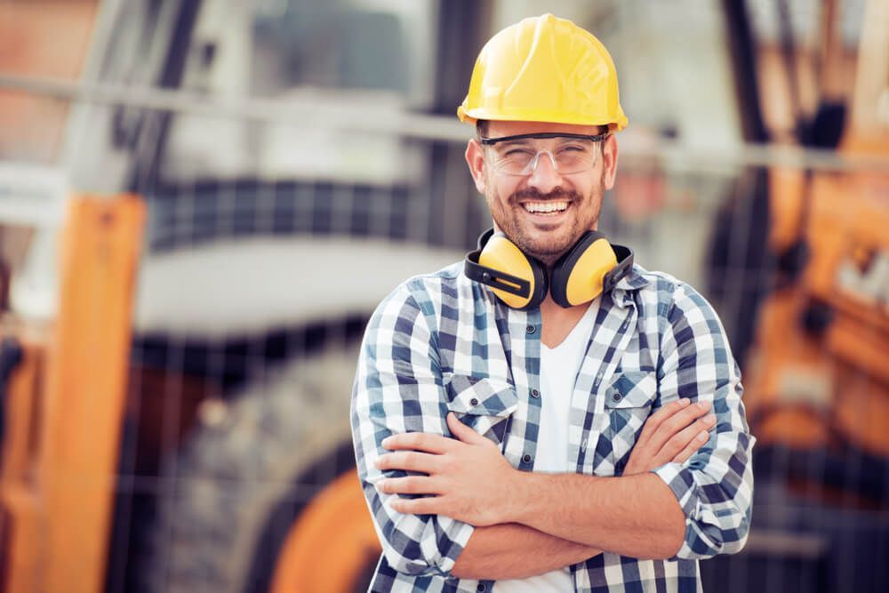 Smiling Construction Site Worker — Civil Contractors in Laurieton, NSW