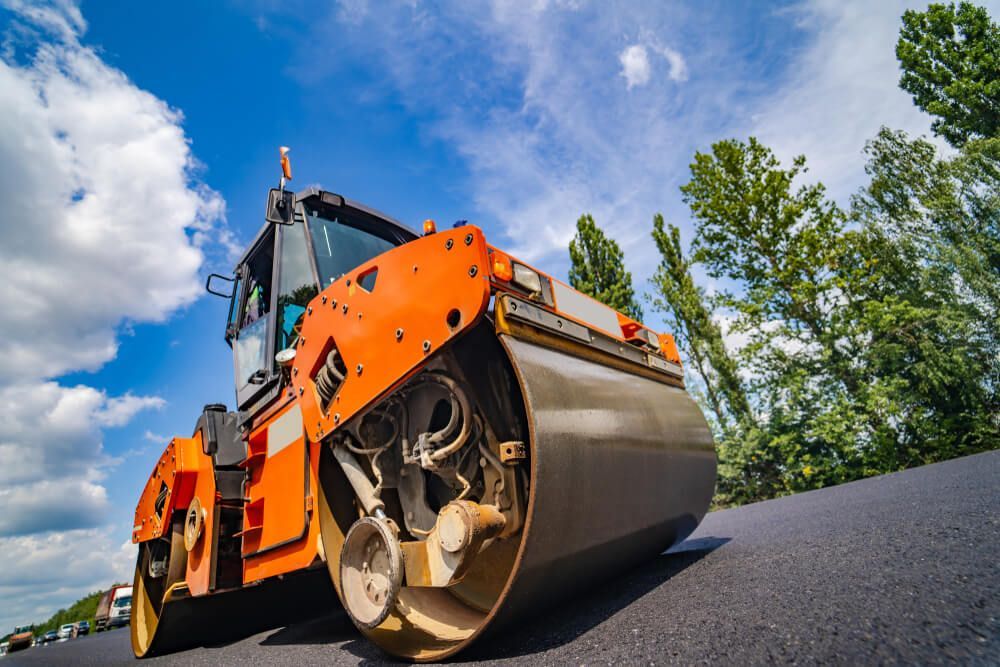 Asphalt Paver in Operation — Civil Contractors in Taree, NSW