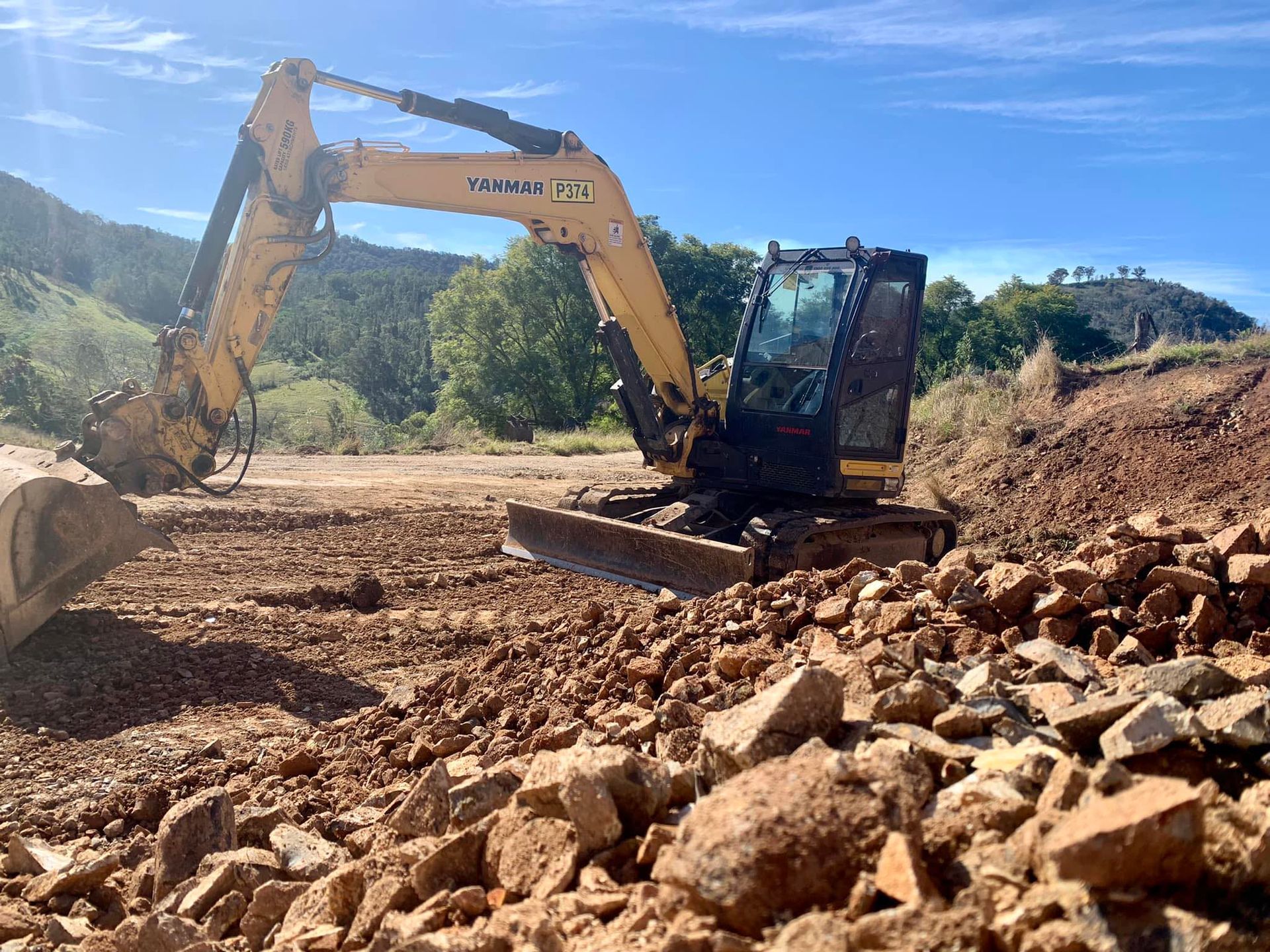 Orange Backhoe — Civil Contractors in Coopernook, NSW