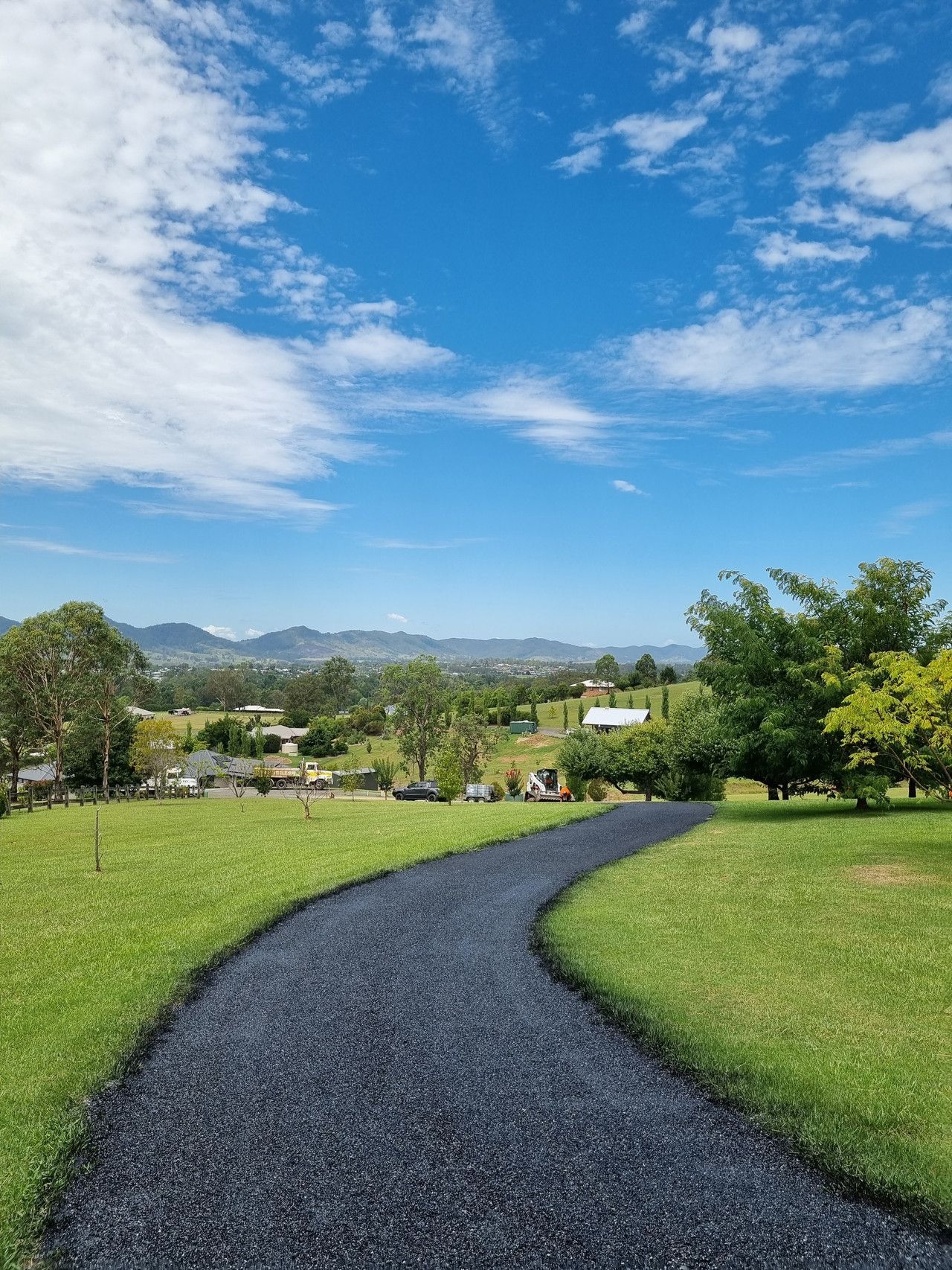 Roller and Workers Asphalting Road — Civil Contractors in Coopernook, NSW