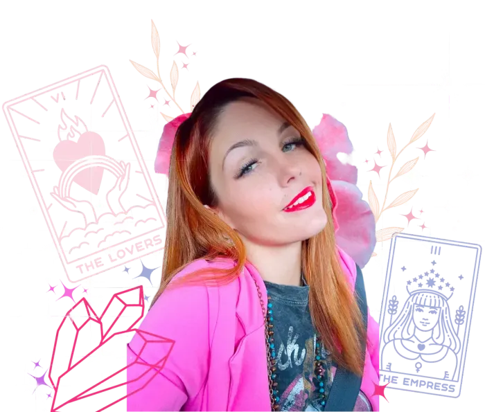 A woman in a pink jacket is standing in front of a tarot card.