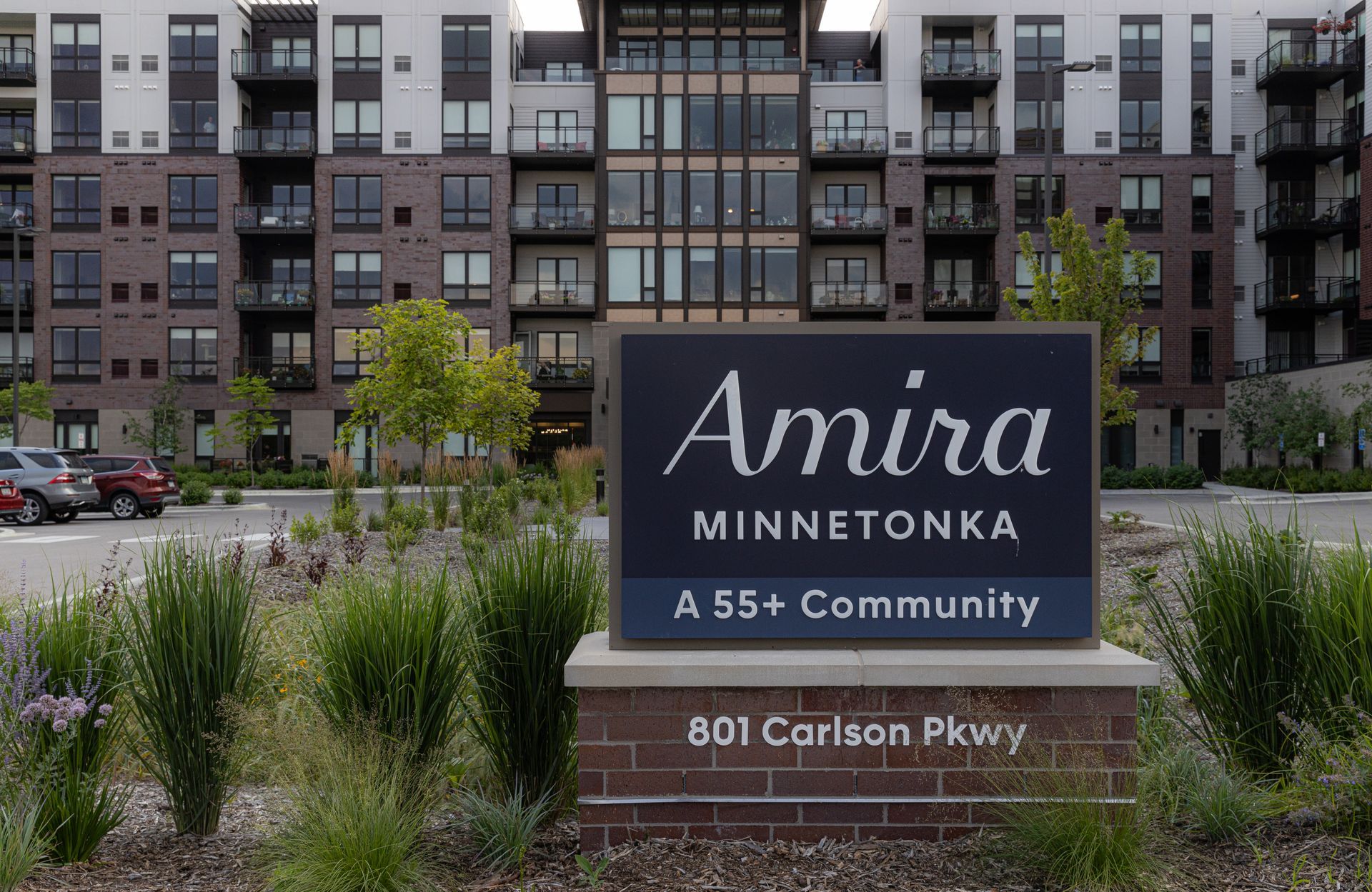 A sign for amira minnetonka a 55+ community