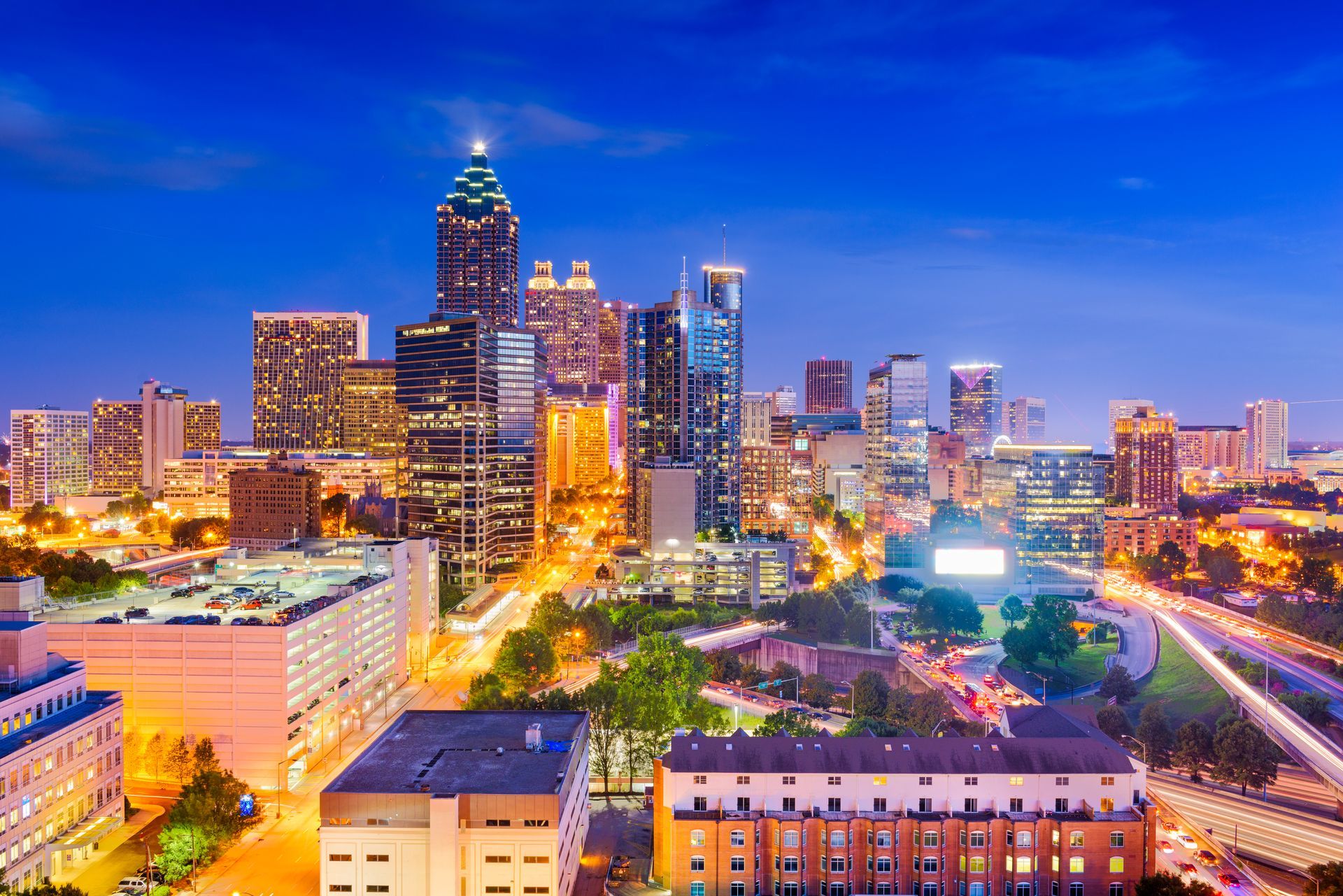 An aerial view of Atlanta, GA skyline at night. Mastertech Environmental Franchise for Sale.