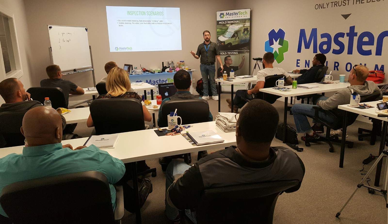 A Mastertech franchise owner on a support call with corporate headquarters, receiving expert guidance on operations and client management.