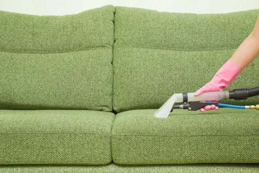 Person in Pink Gloves Cleaning — Phil Lindfield's Big Red Carpet Cleaning In Harrington, NSW