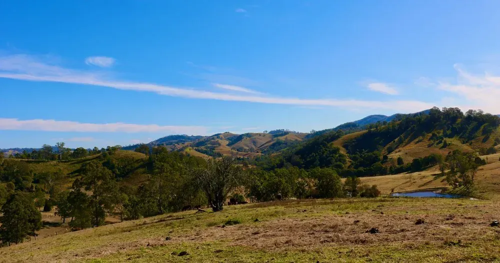 Rolling Green Hills Under a Bright Blue Sky — Phil Lindfield's Big Red Carpet Cleaning In Gloucester, NSW