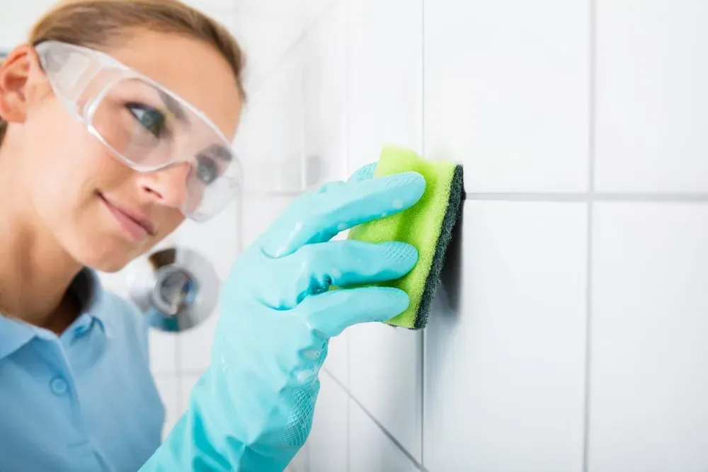 Woman Wearing Safety Glasses — Phil Lindfield's Big Red Carpet Cleaning In Taree, NSW