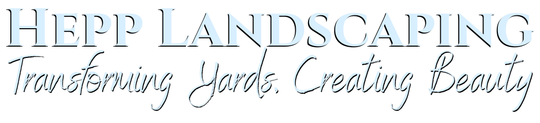 a black and orange logo for h & r hardscape