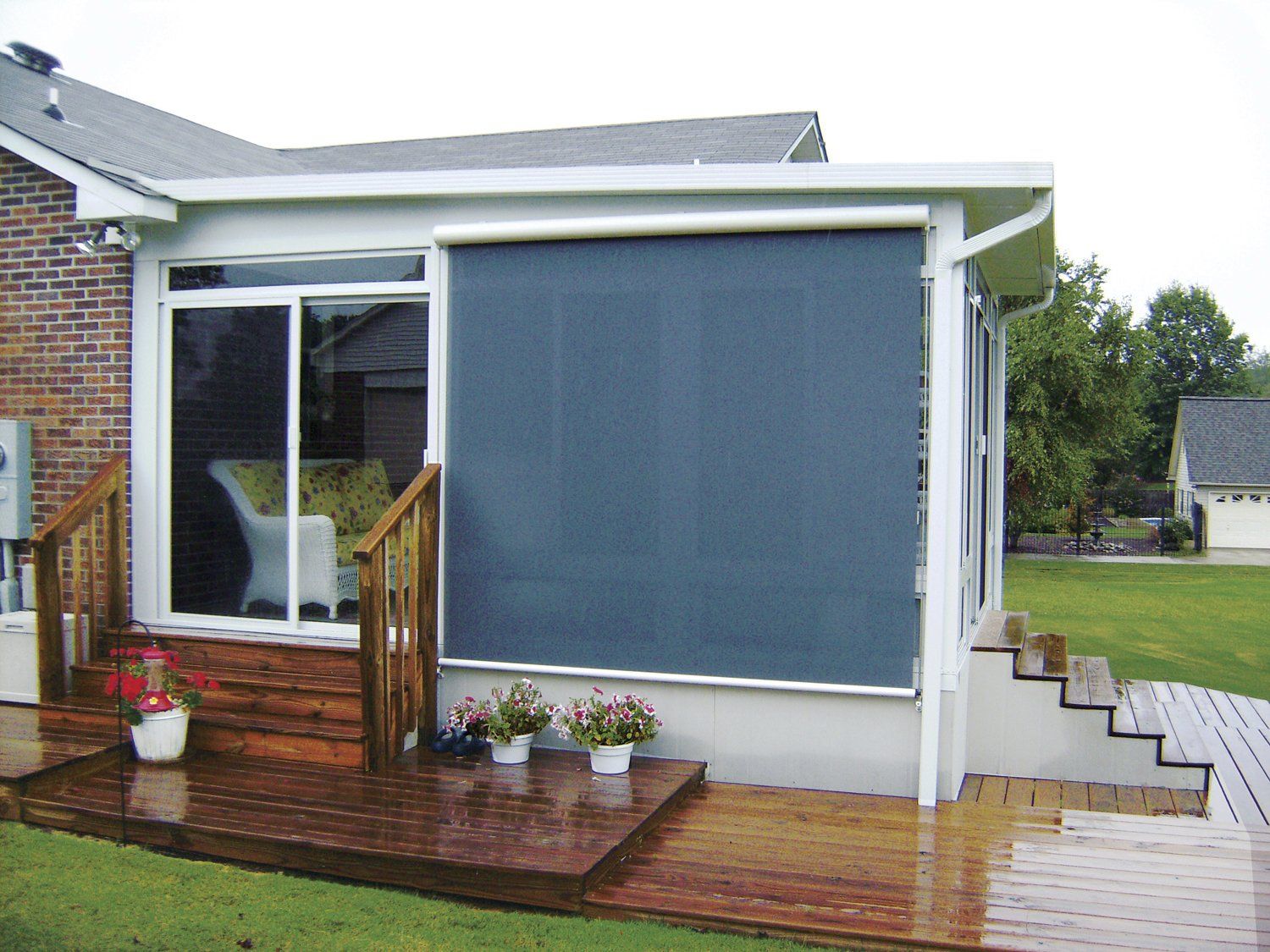 A house with a screen on the side of it