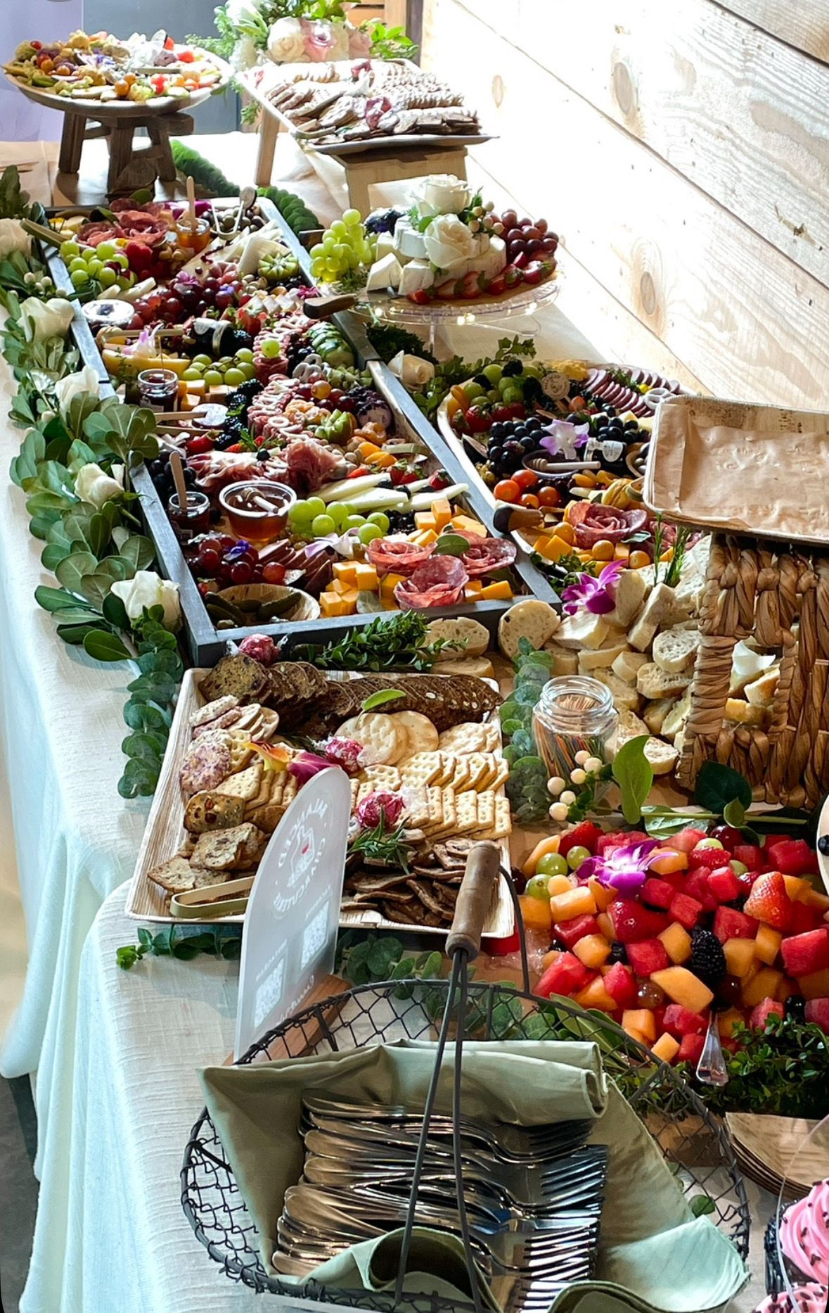 There are many different types of food on the table. charcuterie
