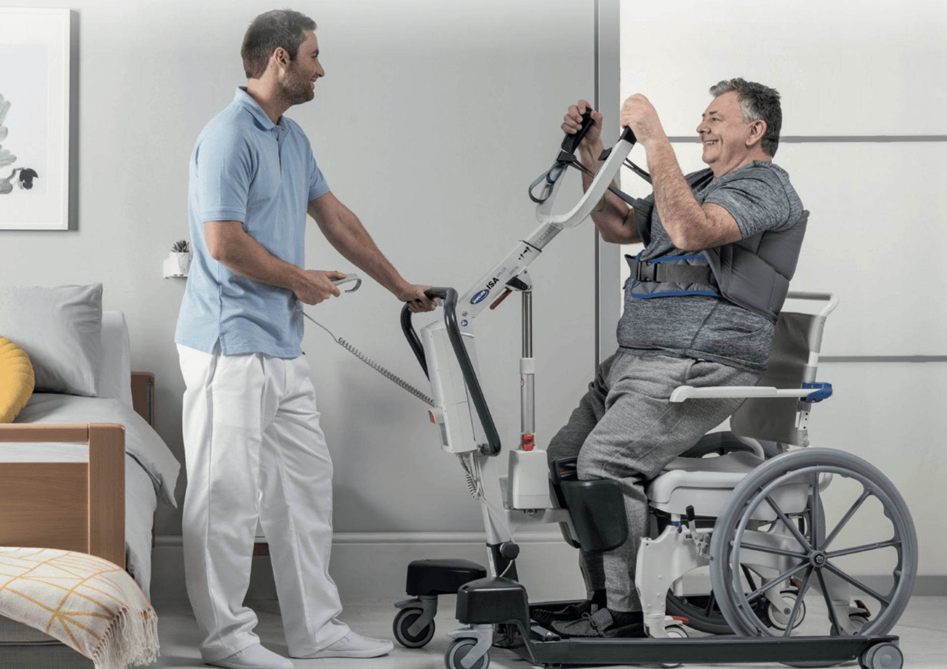 A man is standing next to a man in a wheelchair.