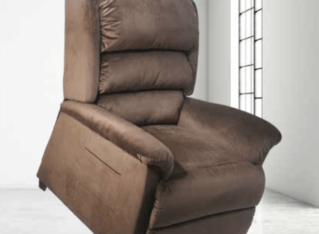 A brown recliner is sitting in a room next to a window.
