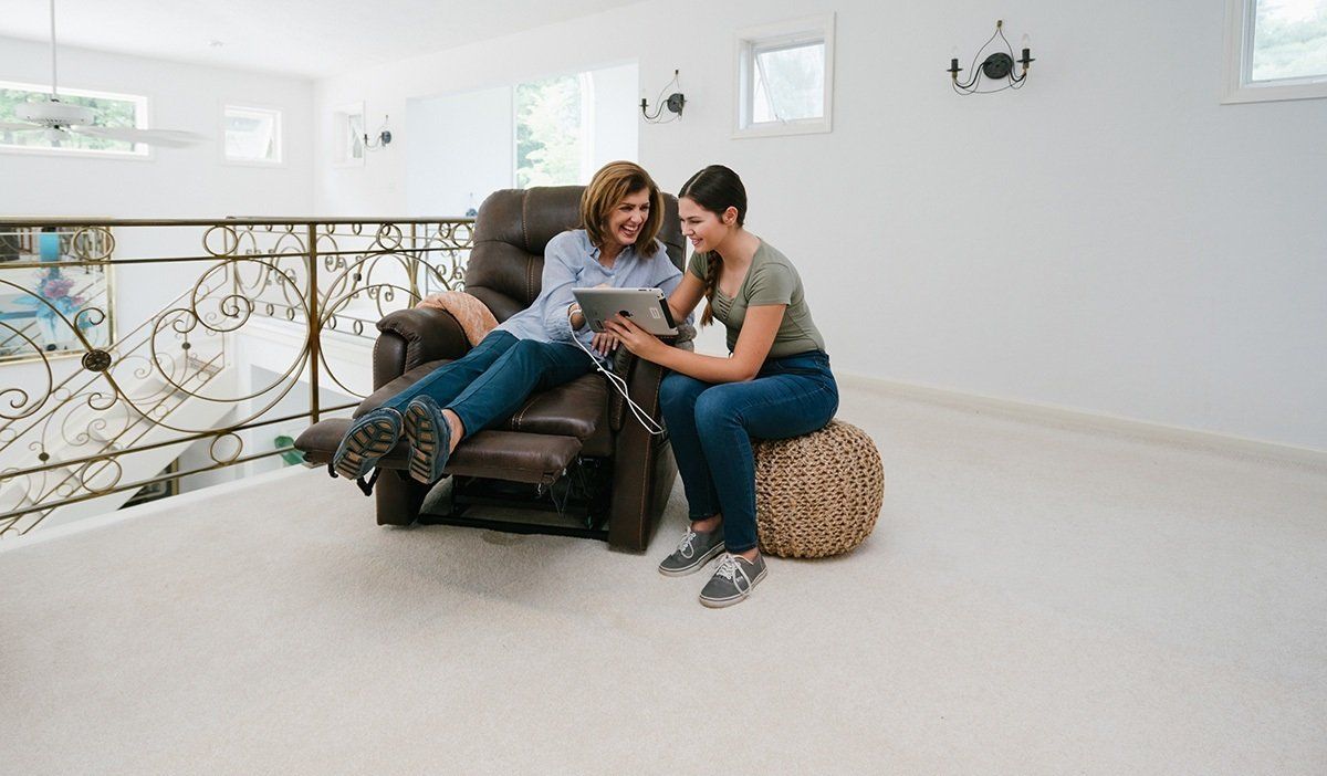 women sitting in Lift chairs