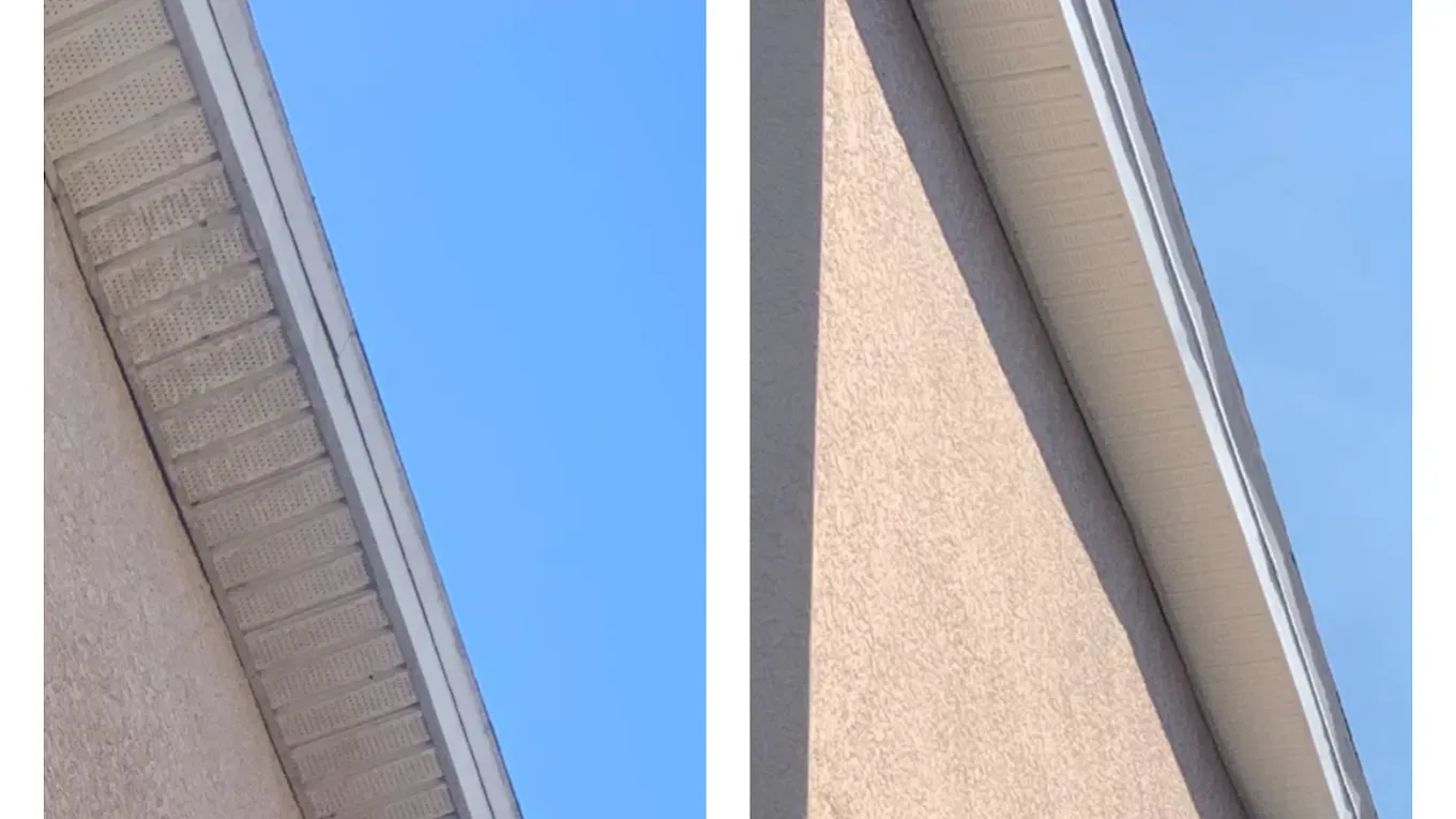 Split view of a building roofline and stucco wall against a blue sky