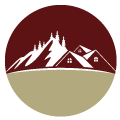 Maroon and tan circular logo with white mountain peaks and small cabins