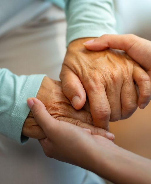 Holding Old Woman Hands