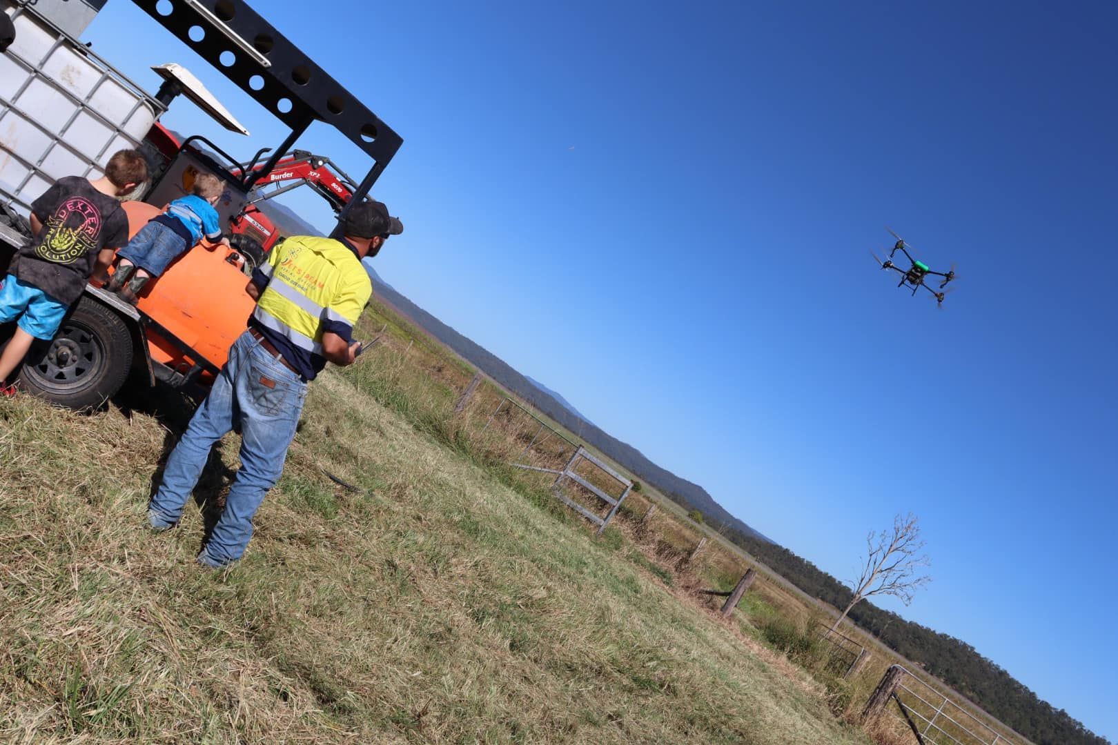 Person Flying a Drone Outdoors — Jetstream Aerial Services in Te Kowai, QLD
