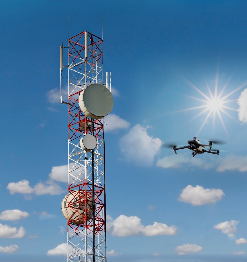 Drone Flying Near a Communications Tower Against a Partly Cloudy, Colourful Sky — Jetstream Aerial Services in Te Kowai, QLD