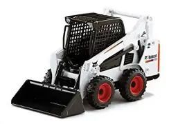 A Bobcat S570 skid-steer loader with a front bucket attachment.