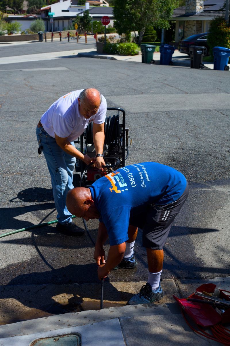 Pedro's Plumbing technician preparing equipment before a residential plumbing service in Los Angeles