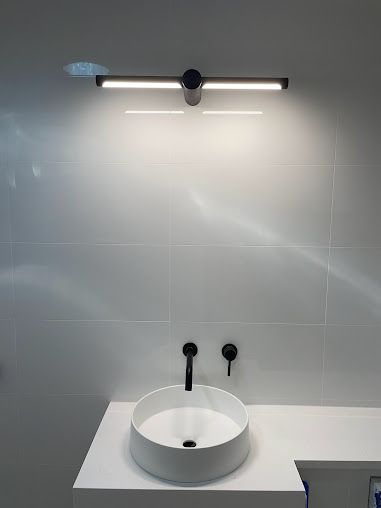 New Led Installed Above The Washing Basin— PRO Solar & Electrical In Newcastle, NSW