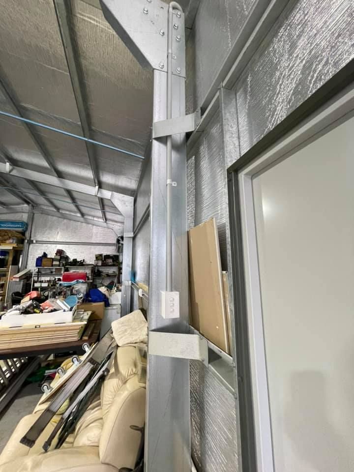 Small white Light switch is installed and Tested — Level 2 Electrician in Newcastle NSW