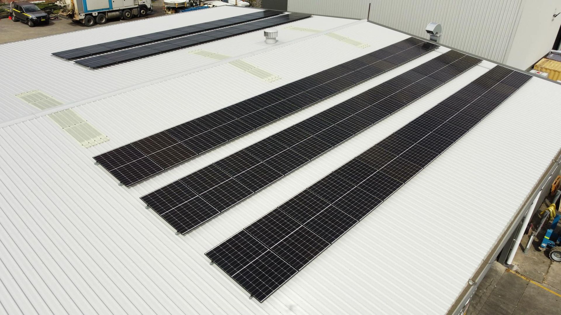 Solar Panels On A Red Tiled Roof — PRO Solar & Electrical In Newcastle, NSW