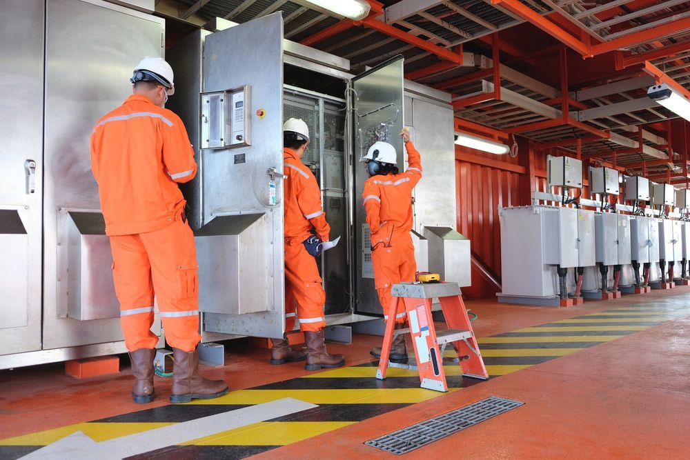 Electricians Inspecting Power Boards — PRO Solar & Electrical In Newcastle, NSW