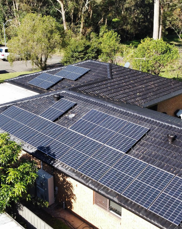 A House With A Lot Of Solar Panels On The Roof — PRO Solar & Electrical In Port Stephens, NSW
