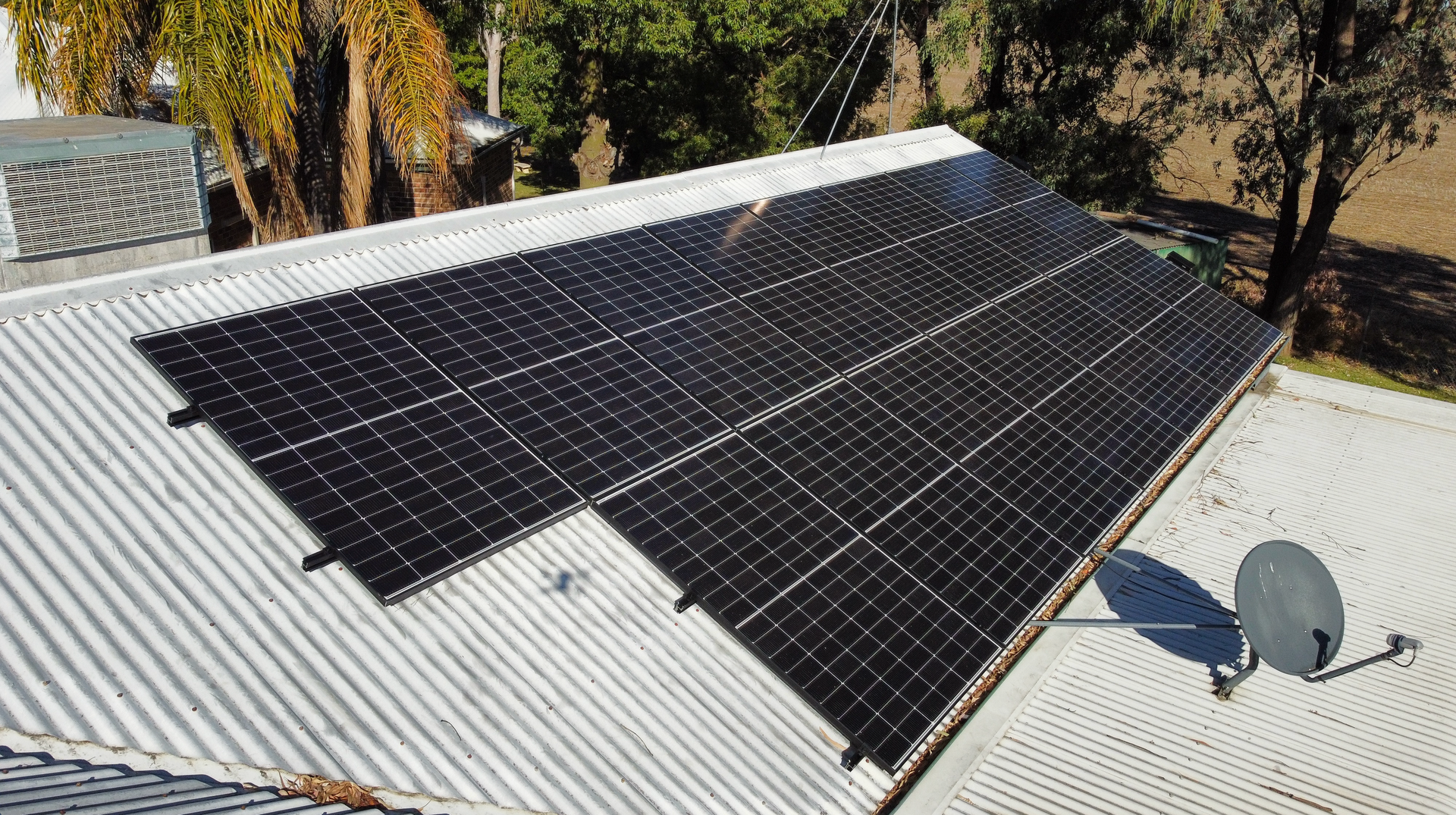 Sunlight Illuminating A Solar Panel, Generating Sustainable Energy — PRO Solar & Electrical In Port Stephens, NSW