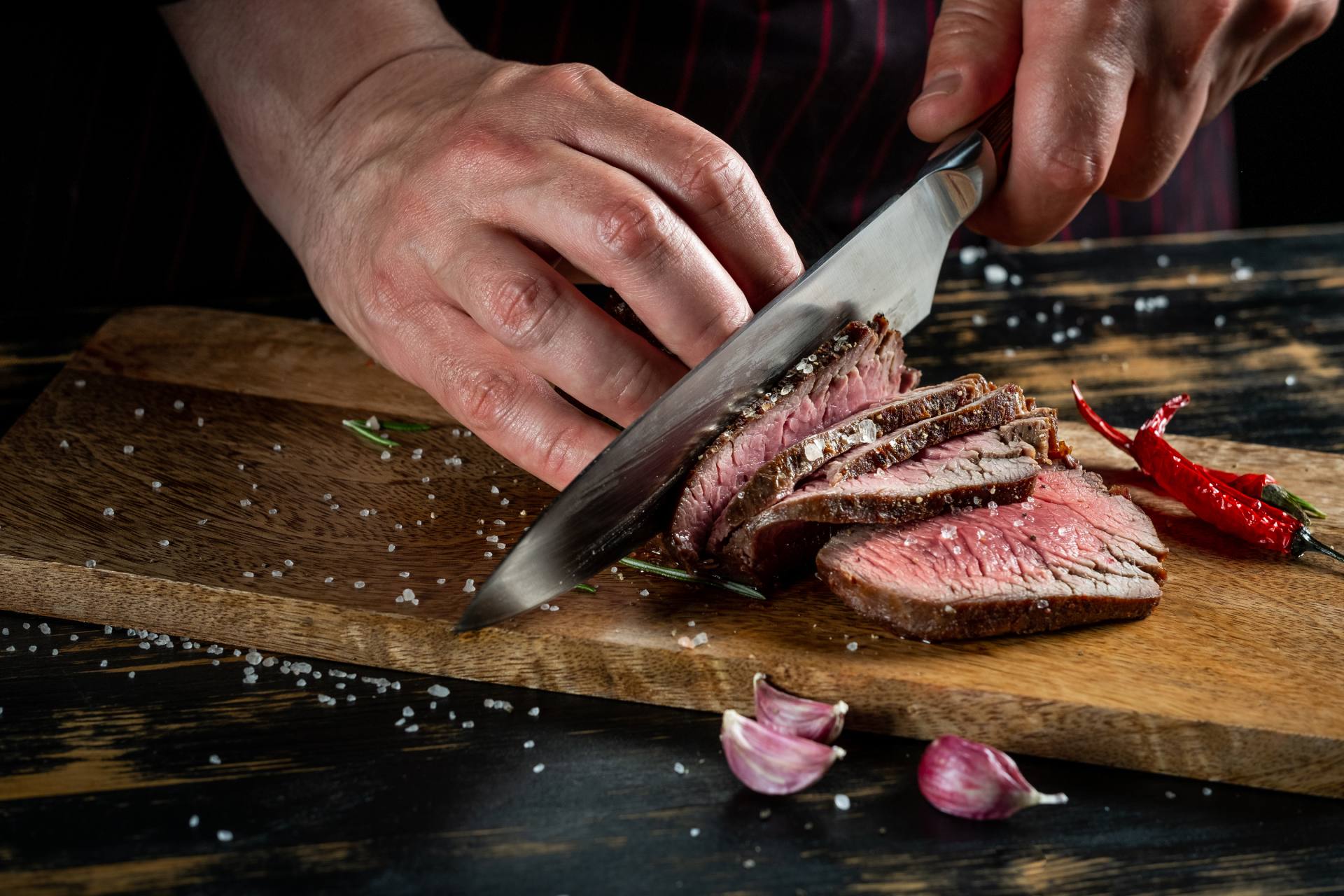 chopping the meat on the chopper board