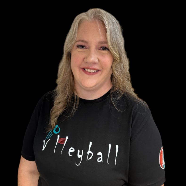 Smiling woman in a black “Volleyball” T-shirt on a black background