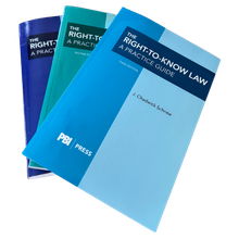 Three books titled the right to know law are stacked on top of each other