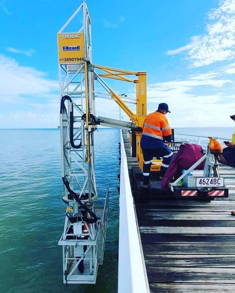 A Boat with A License Plate — Paton's Electrical Services in Urangan, QLD