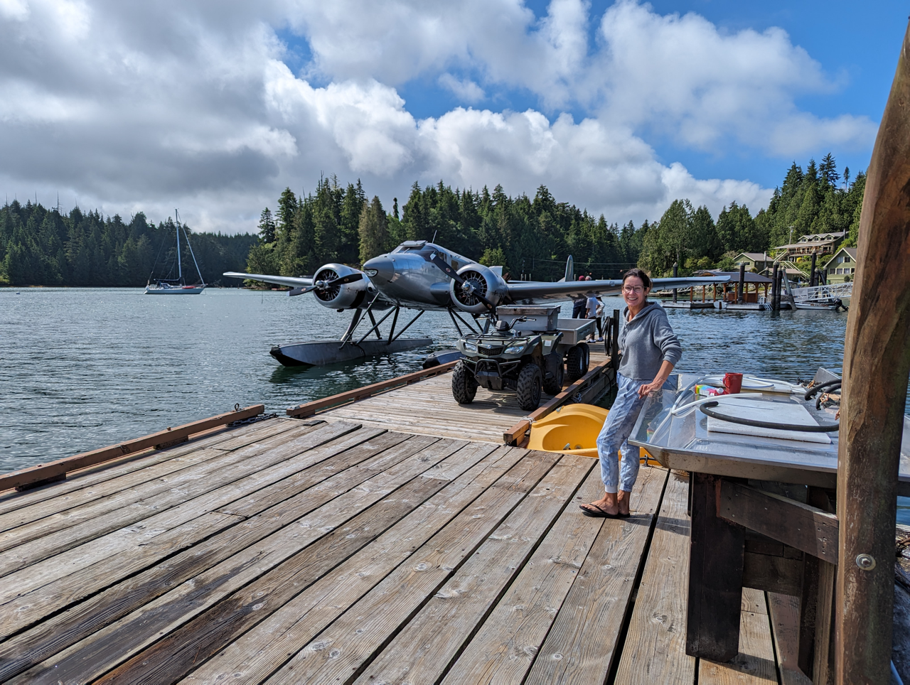 A float plane lands and docks at Woods End Landing in Bamfield