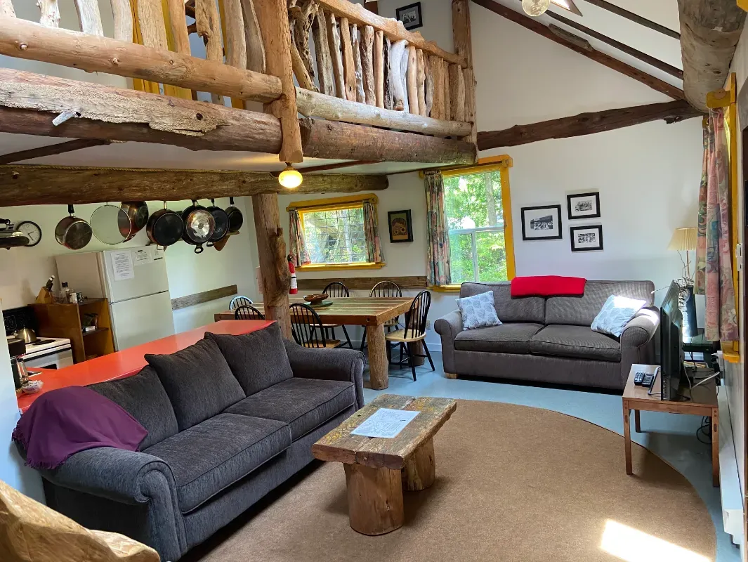 A living room with two couches and a coffee table