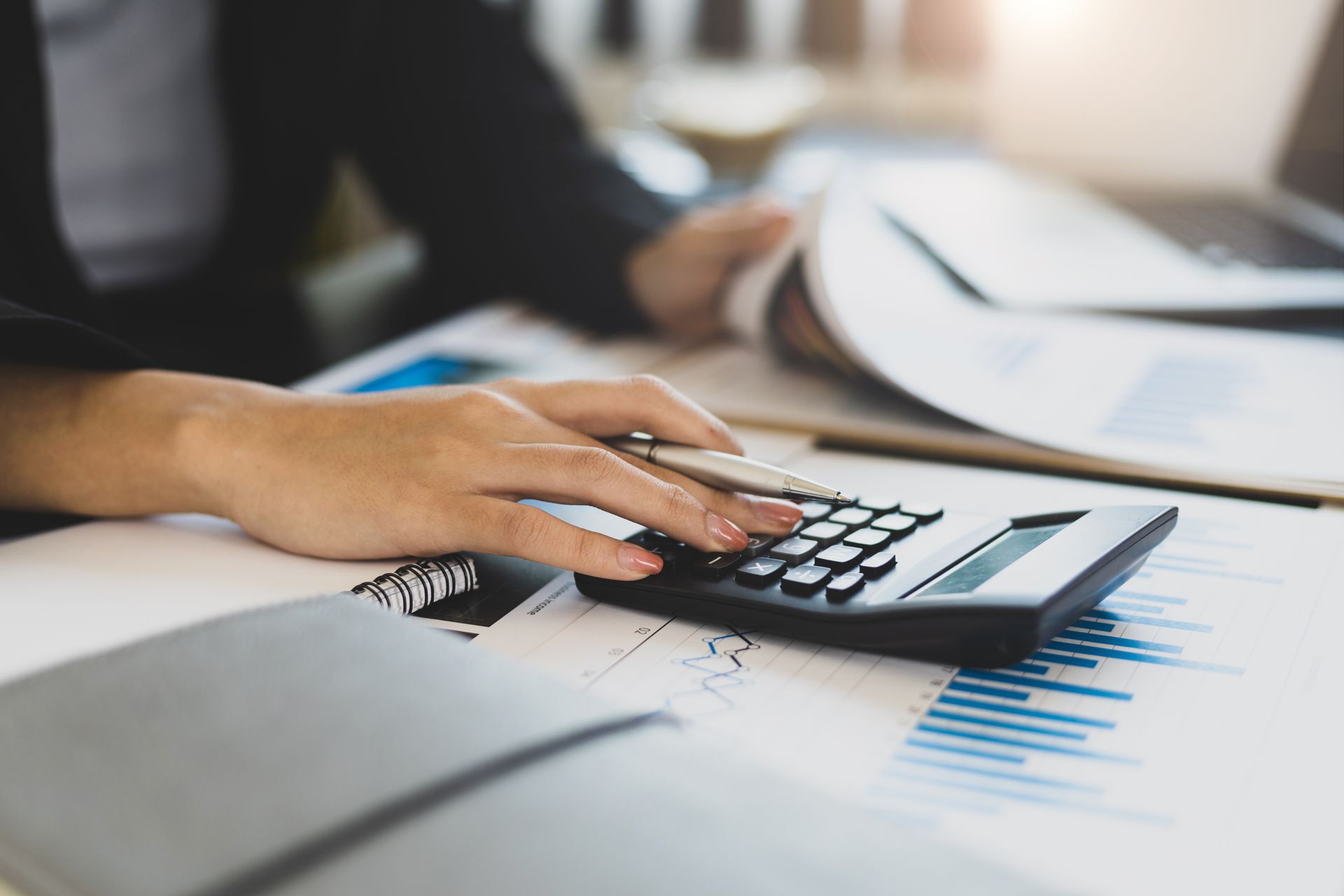 woman using calculator