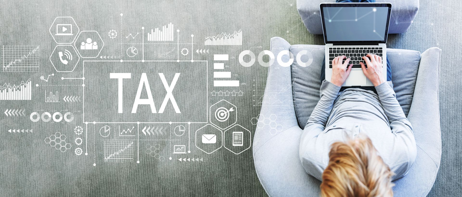 person at computer with tax on screen