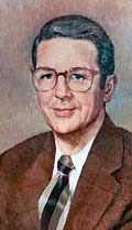An oil portrait of a person with short brown hair and glasses, wearing a brown jacket, a white shirt, and a striped tie.