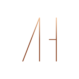 Abstract orange line drawing resembling the letters A and H on a white background
