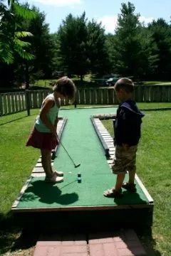 Kids Playing Golf on Park — Wilton, WI — Tunnel Trail Campground