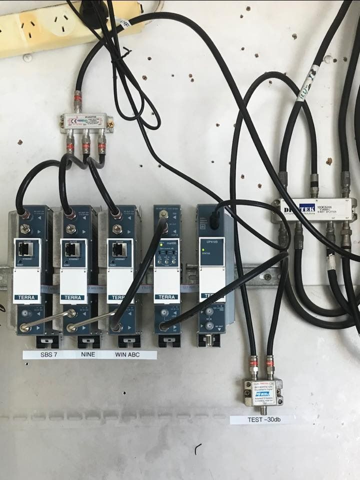 A Bunch Of Wires Are Connected To A Wall — Bradshaws Radio & TV Service In Maryborough, QLD