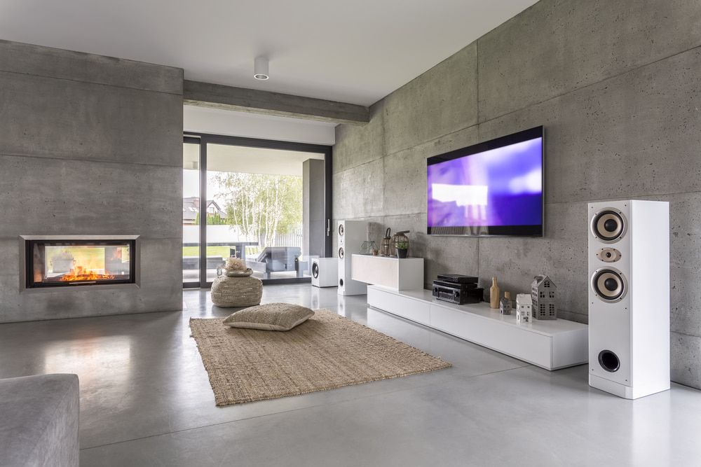 A Living Room With A Flat Screen Tv And Speakers — Bradshaws Radio & TV Service In Maryborough, QLD