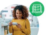 Woman looking at oral contraception pack