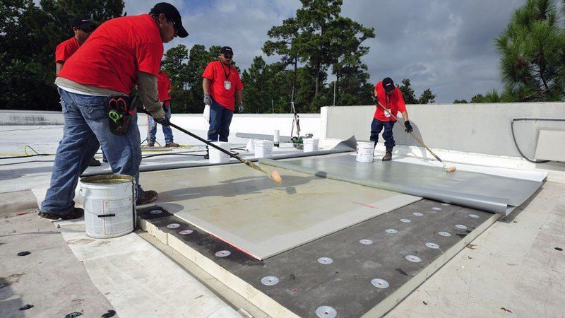 Roof Repair Men working 1st Choice Roofing & Contracting Builder Arkansas