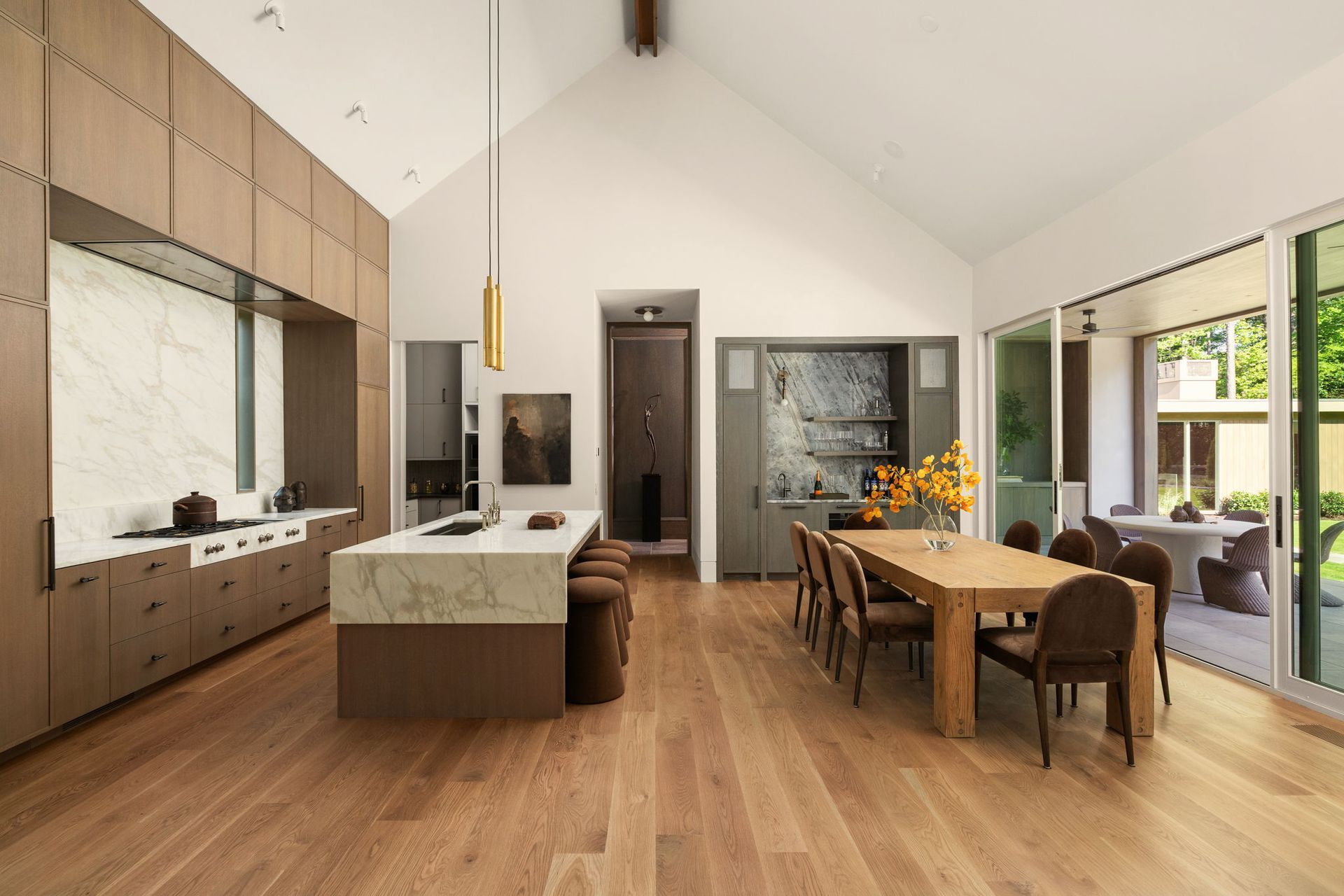Wide view of kitchen and dining room